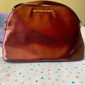 Michael Kors Sling body bag!  Never used. Absolutely new.